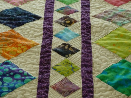 The rows are joined by deep purple sashing