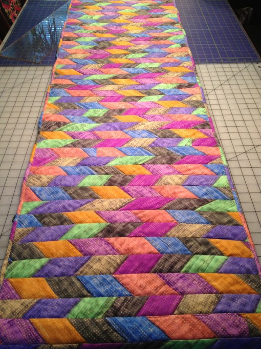 Mixed bright colors for a low wall covering behind my husbands desk.