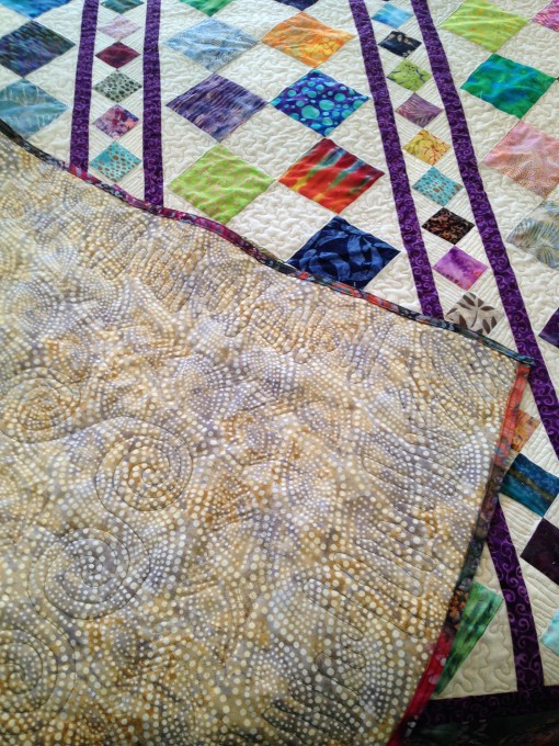 Reverse - gold-toneed batik swirls